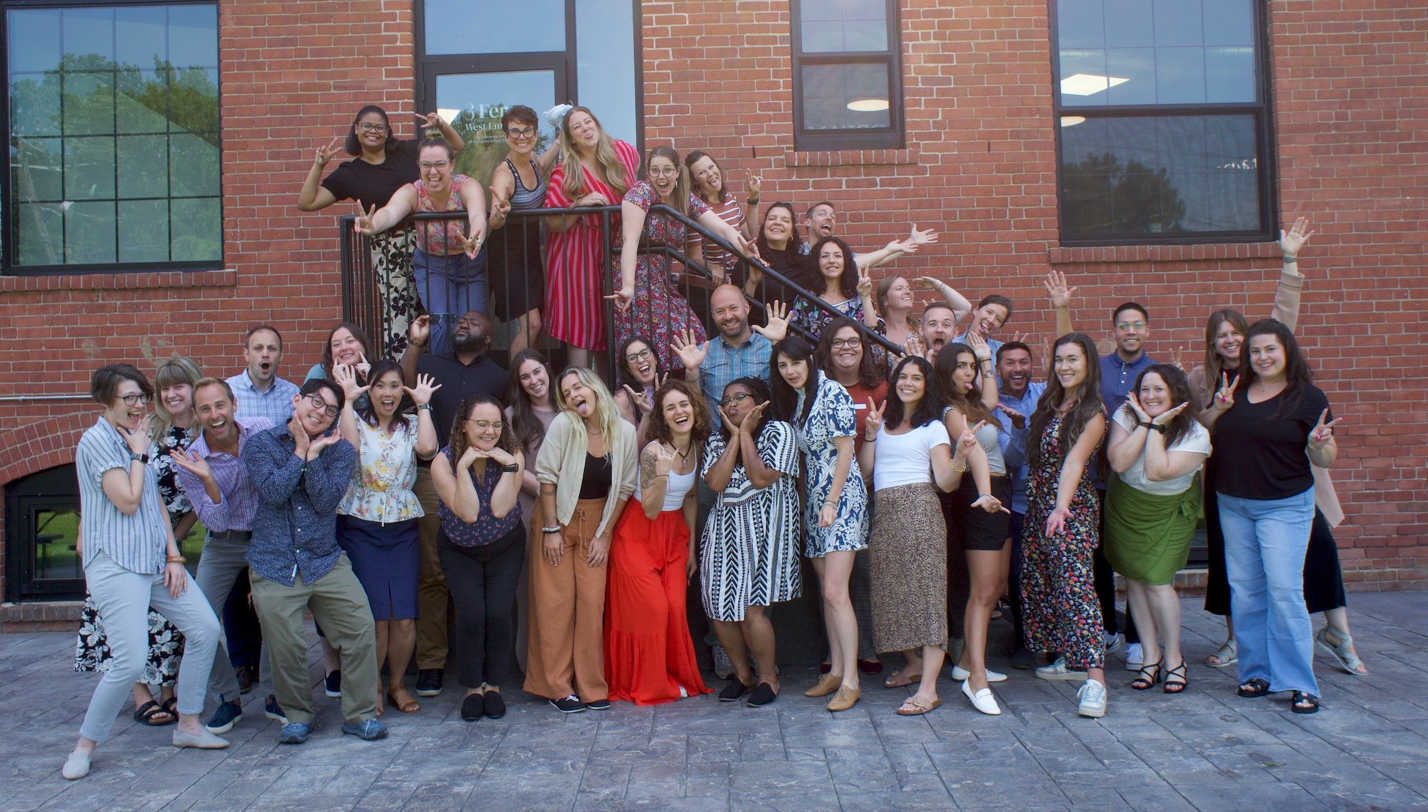 Silly group photo in front of our Massachusetts office